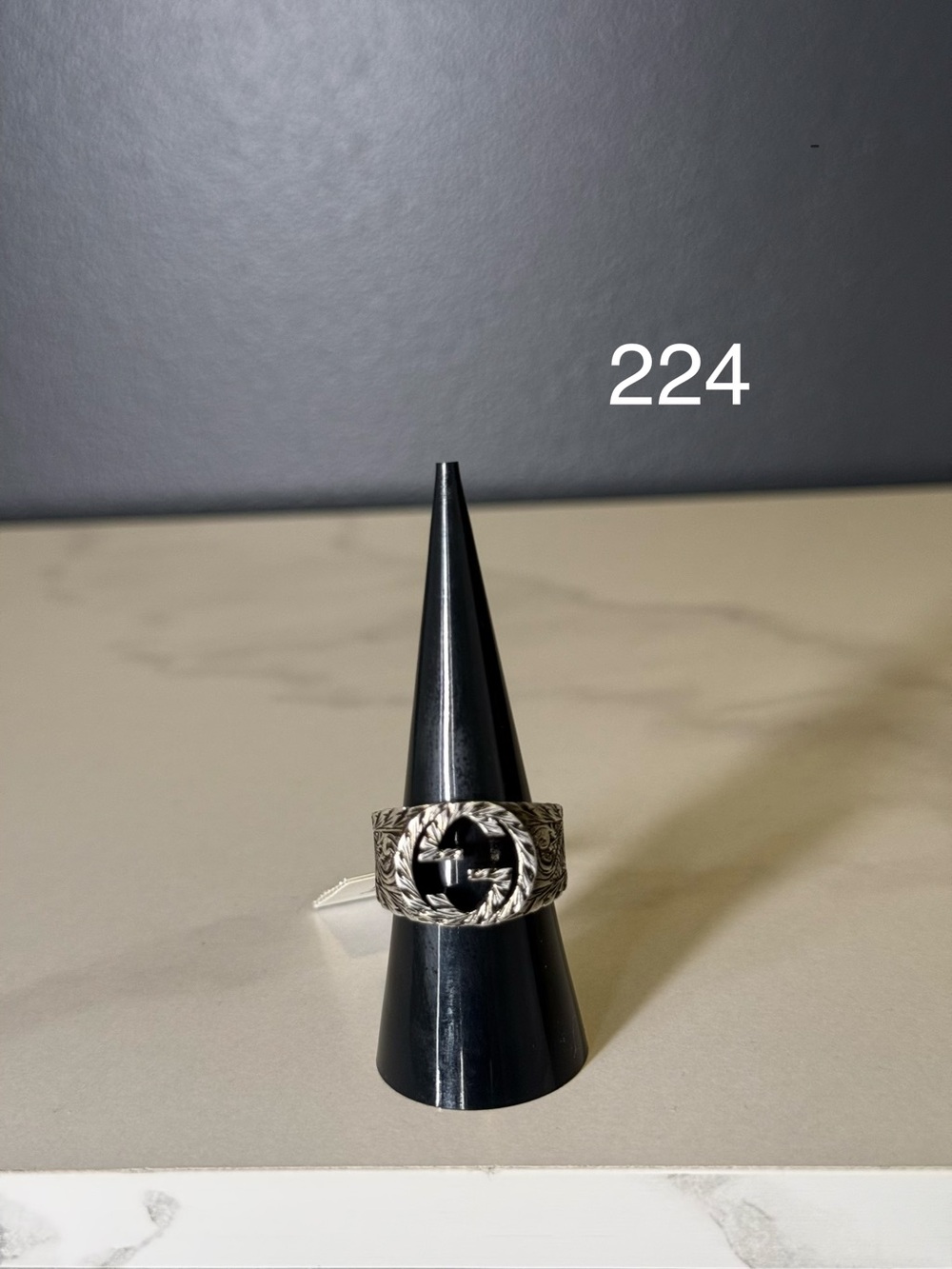 Gucci Silver Ring with Black Center Emblem and Engraved Band